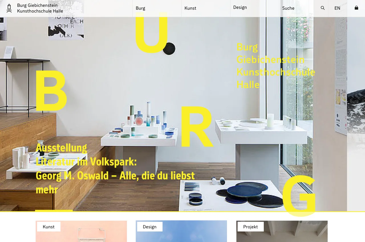 Burg Halle landing-page concept with an oversized letter B, editorial imagery, and the beginning of a modular content grid.